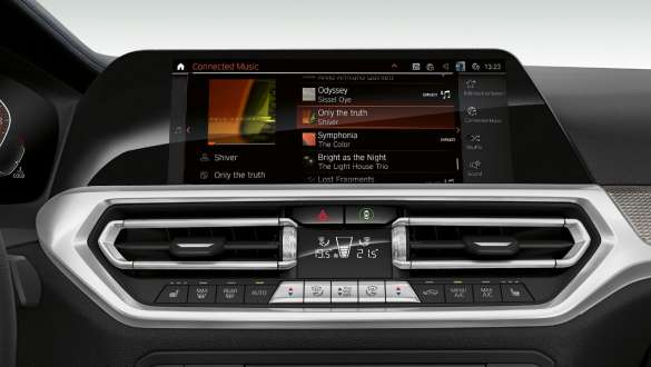 Frontal close-up of the cockpit display of the BMW 3 Series Sedan with Connected Music.