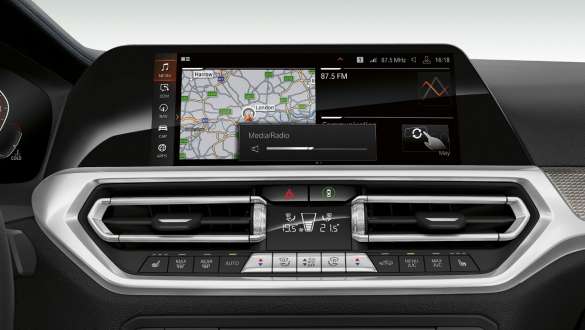 Frontal close-up of the cockpit display of the BMW 3 Series Sedan with BMW Gesture Control.