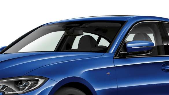 Three-quarter side shot of the BMW 3 Series Sedan with focus on the front and driver side windows with Acoustic glazing.