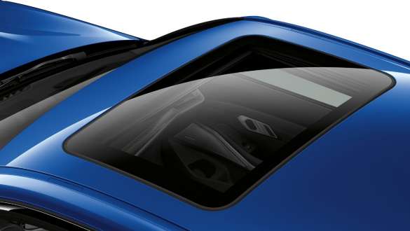 View of the BMW 3 Series Sedan from above with a view of the closed glass roof.