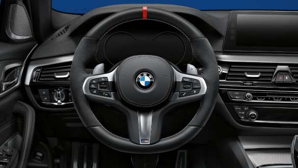 Close-up view of the BMW 3 Series Sedan with focus on the BMW M Performance steering wheel.