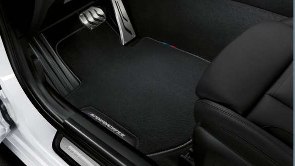 Close-up view of the BMW 3 Series Sedan with focus on the BMW M Performance floor mats.